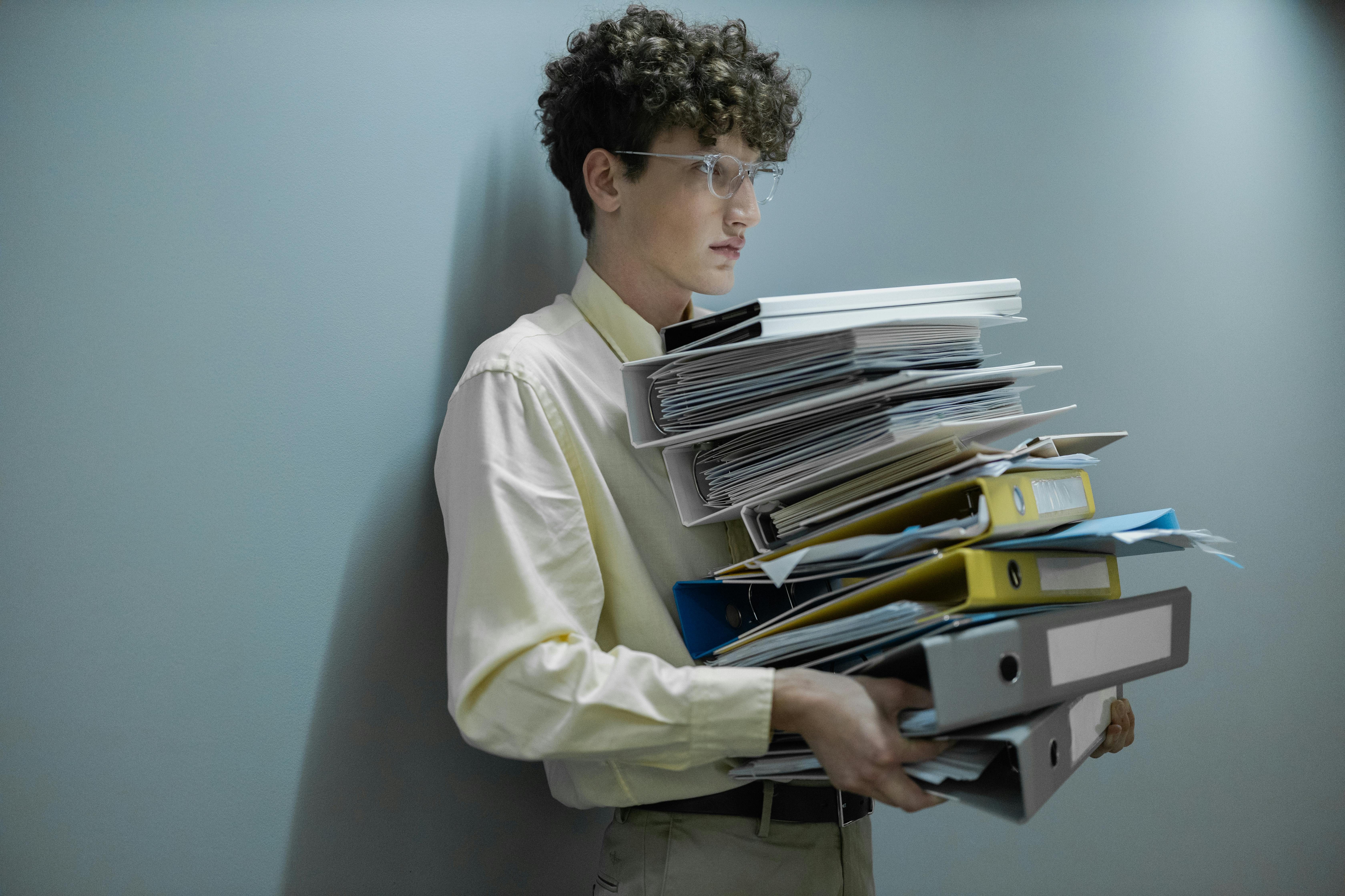 Filing Renewal Green Card person with a lot of paperwork